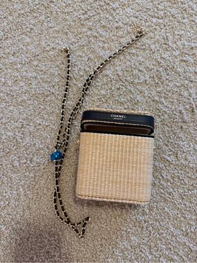 CHANEL Raffia Crossbody Bag with Black and Gold Trim